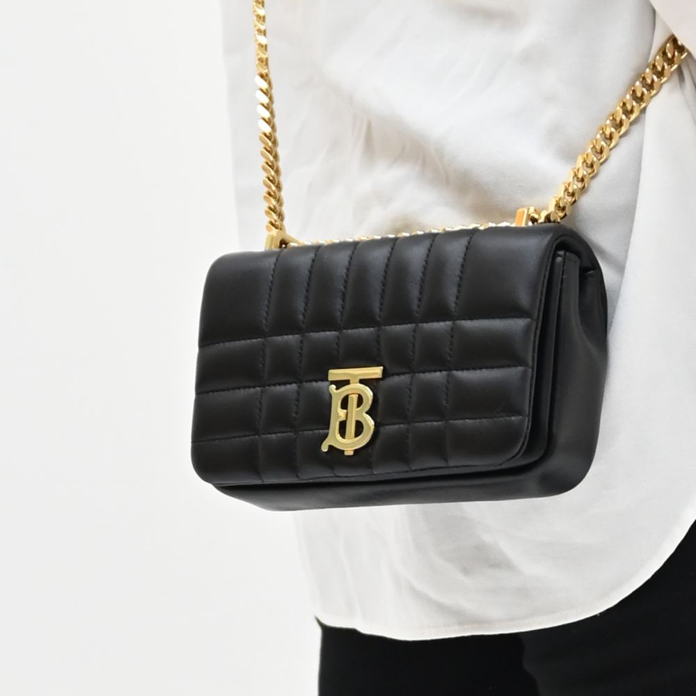 Burberry Quilted Lambskin Mini Lola Bag in black with gold-tone hardware.