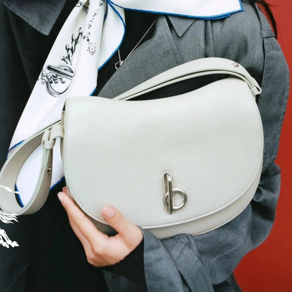 Burberry Rocking Horse Bag in a neutral/hunter colorway.