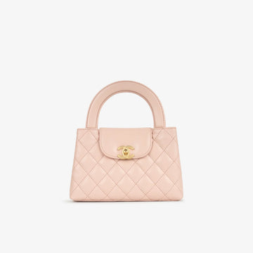 Chanel Shiny Aged Calfskin Quilted Nano Kelly Shopper in light pink with brushed gold-tone hardware