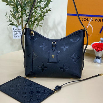 Louis Vuitton CarryAll PM or MM Monogram Empreinte Leather handbag in black