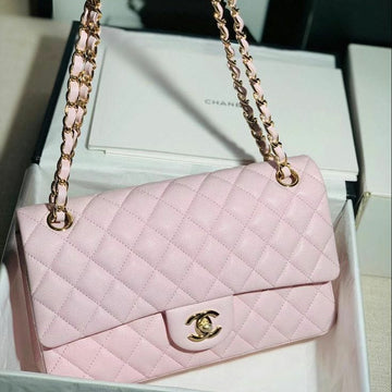 Chanel Classic Flap Bag in  pink quilted caviar leather with gold hardware