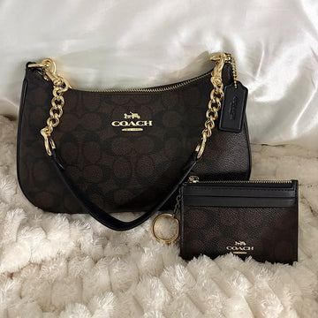 Coach Teri Shoulder Bag in Signature Canvas paired with a matching small card case or wallet