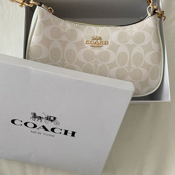 Coach Teri Shoulder Bag in Signature Canvas in a light beige/cream colorway
