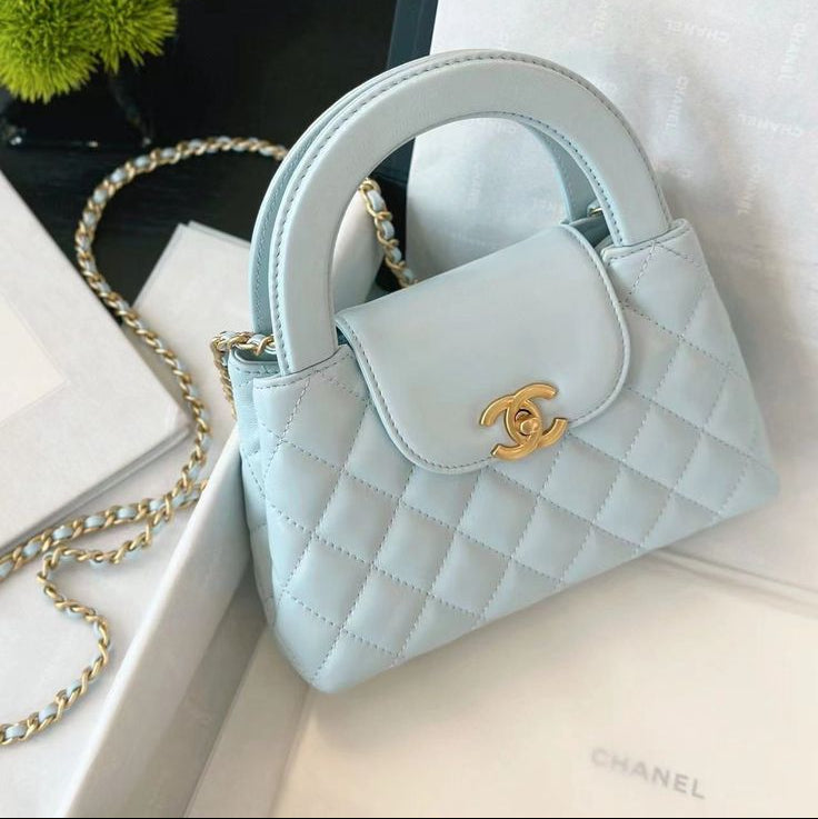 Chanel Nano Kelly Shopper bag in light or baby blue quilted calfskin with gold-tone hardware