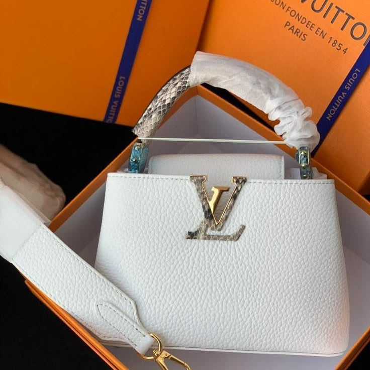 Louis Vuitton Capucines Mini handbag crafted in white Taurillon leather
