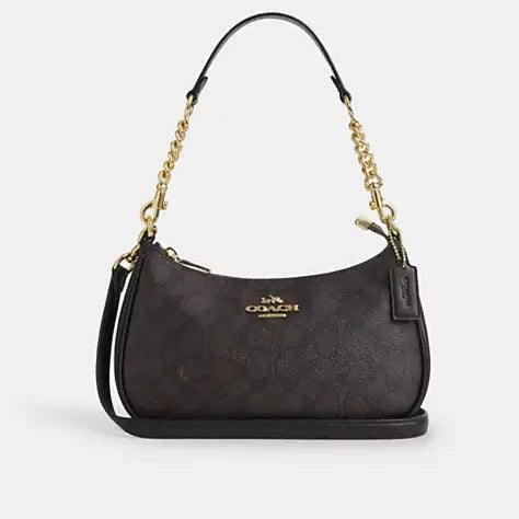 Coach Teri Shoulder Bag in Signature Canvas paired with a matching small card case or wallet