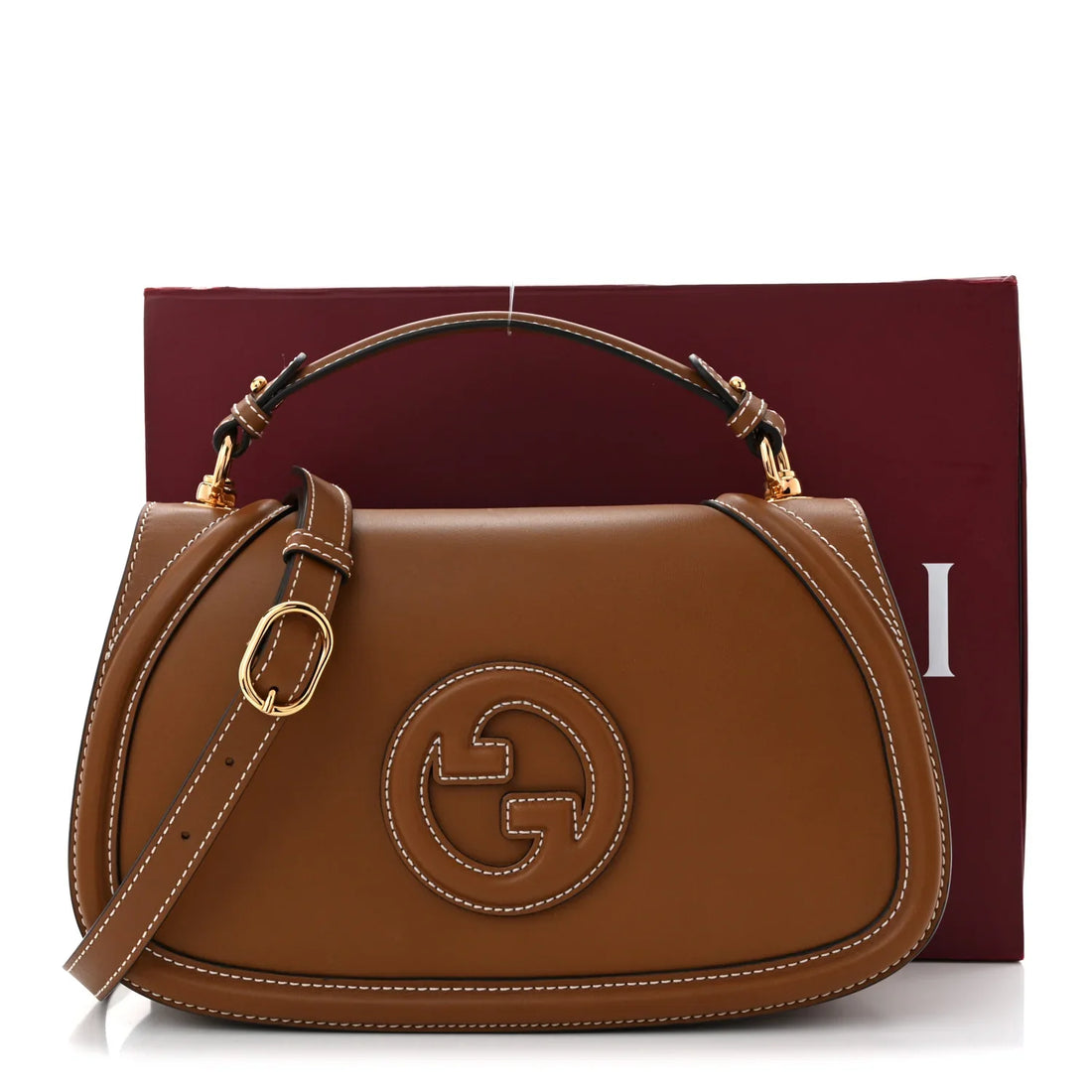 Gucci Blondie Small Top Handle Bag in brown leather.