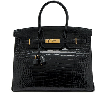 Hermès Birkin Bag crafted in black shiny exotic crocodile leather with gold-tone hardware